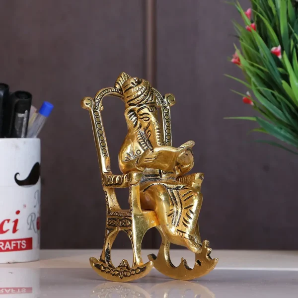 Chair Ganesha ji Reading Book with Antique Work,Ganesha Metal Statue,Ganpati Murti Idol for Pooja & Home,Office Décor Ganesh idol for Car Dashboard Religious Showpiece for Decoration & Gifting Article...