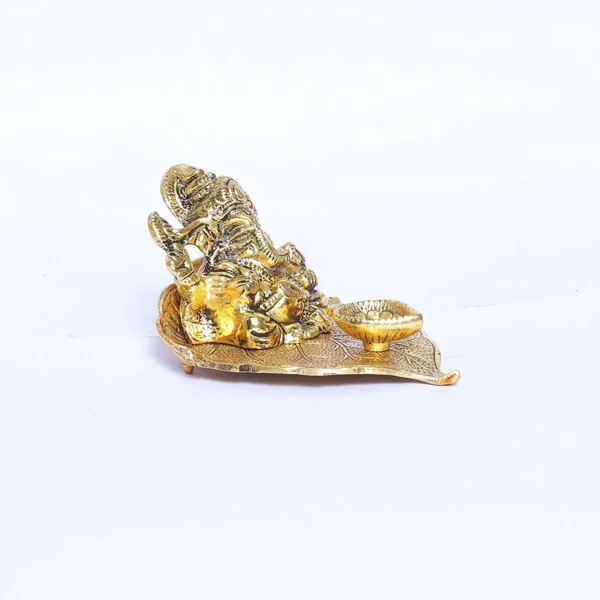 Metal Lord Ganesha On Leaf with Diya Idol for Pooja Room Showpiece for Room,Office & Table,car and Gift for Have Anniversaries, Birthday.