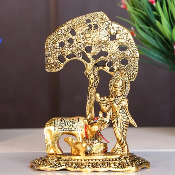 MG0120A Kamdhenu Cow with Krishna Standing Under Tree Plying Flute Metal Statue (12 X 8 X 17 cm, Gold)